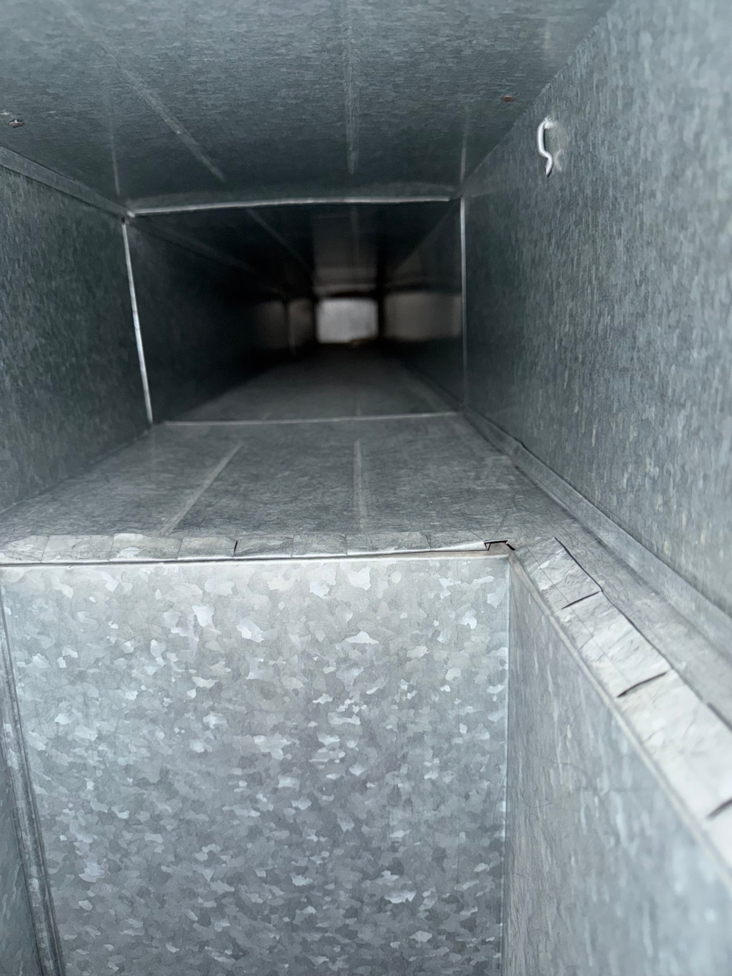 Air Duct Cleaning after — Wood duct interior